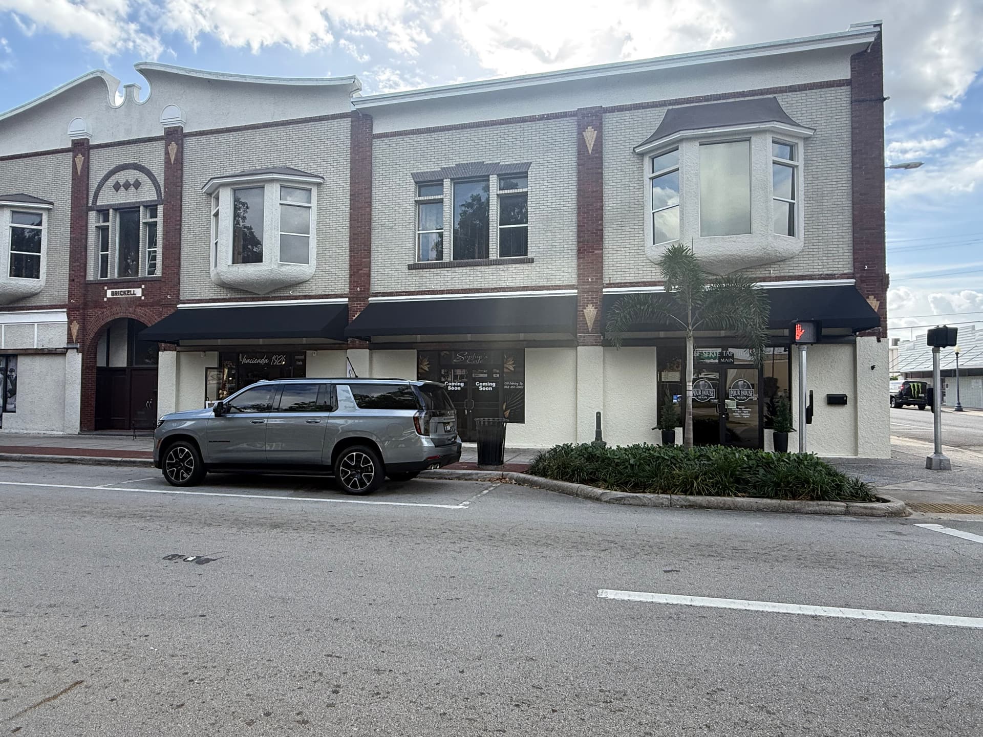 Gallery photos for Bold Black Sunbrella Awnings Upgrade Downtown Avon Park Storefronts: Image #1