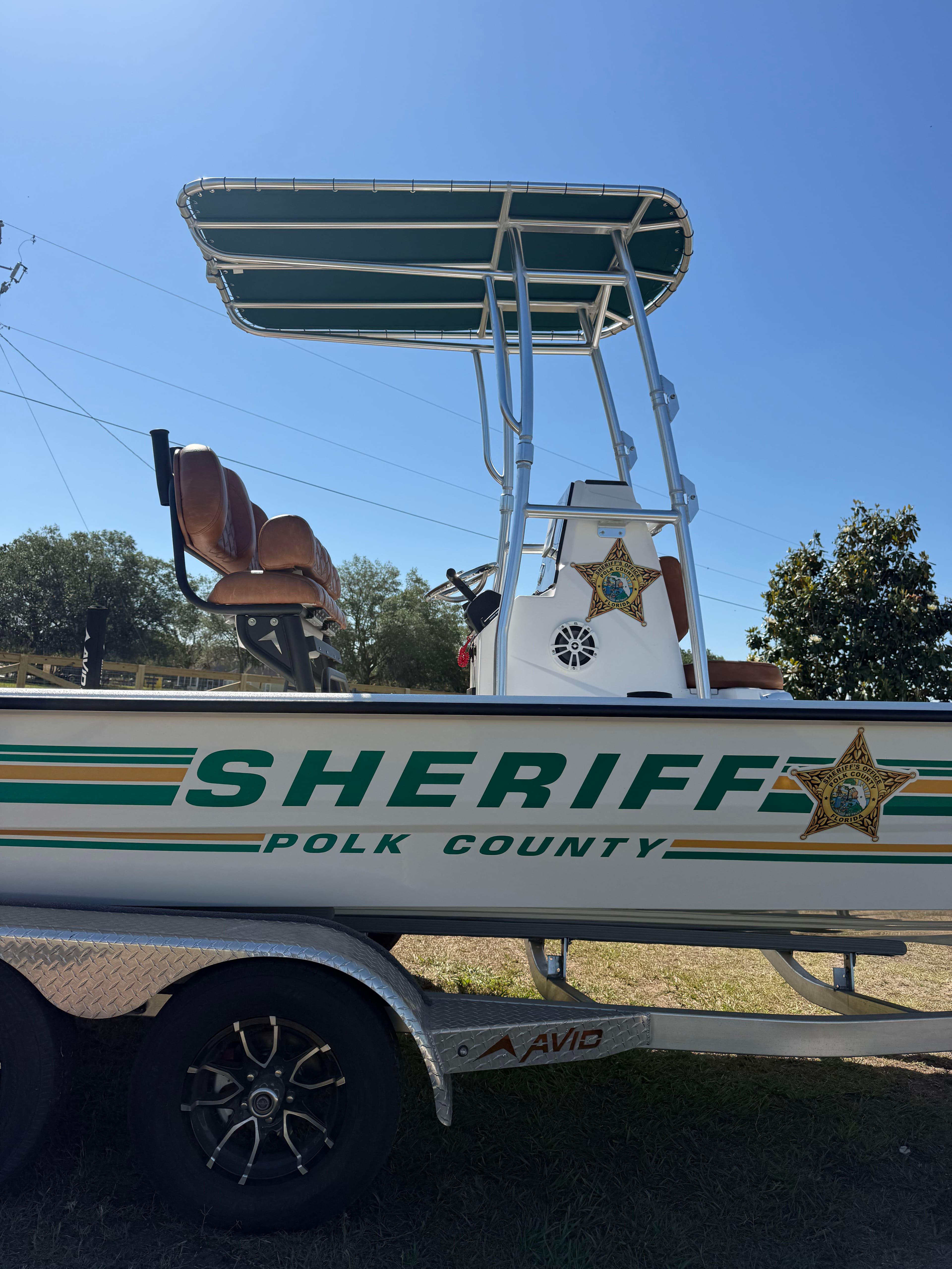 Project Custom T-Top Hinge Mod on a Polk County Sheriff Boat image