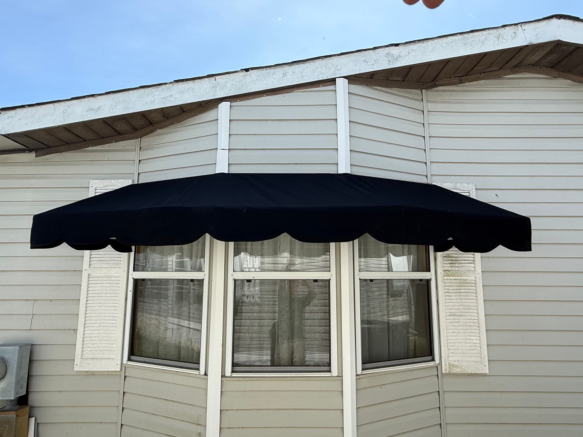 Gallery photos for Bay Window Awning Recover in Black Sunbrella in Winter Haven: Image #1