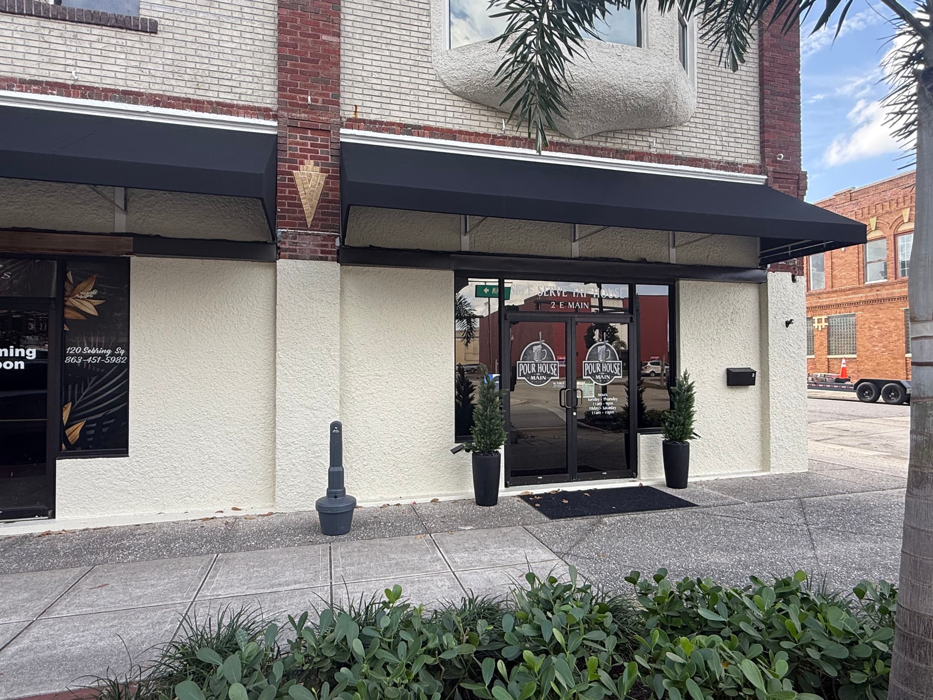 Gallery photos for Bold Black Sunbrella Awnings Upgrade Downtown Avon Park Storefronts: Image #3