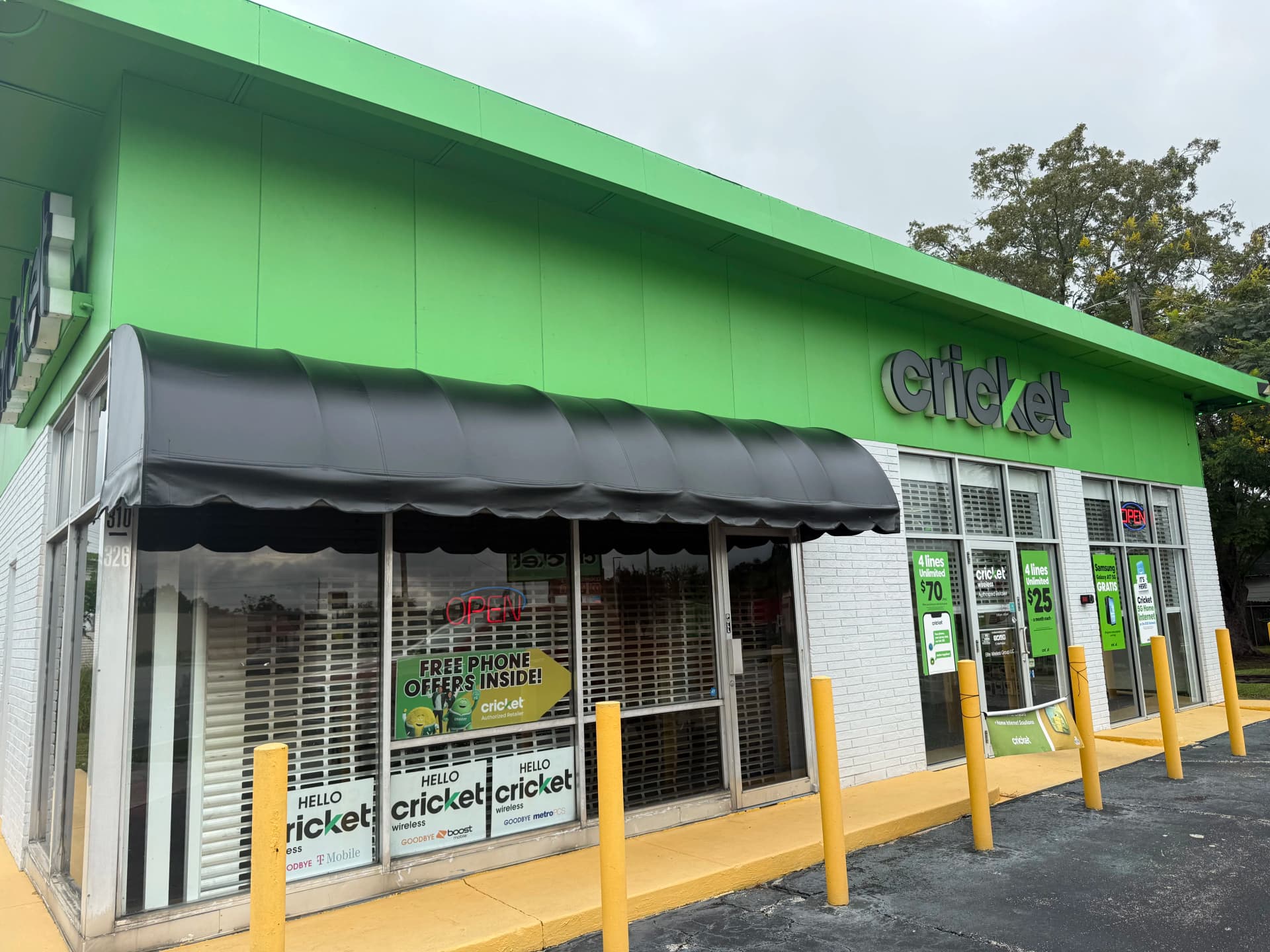 New Black Vinyl Awning Installed on Auburndale Storefront image