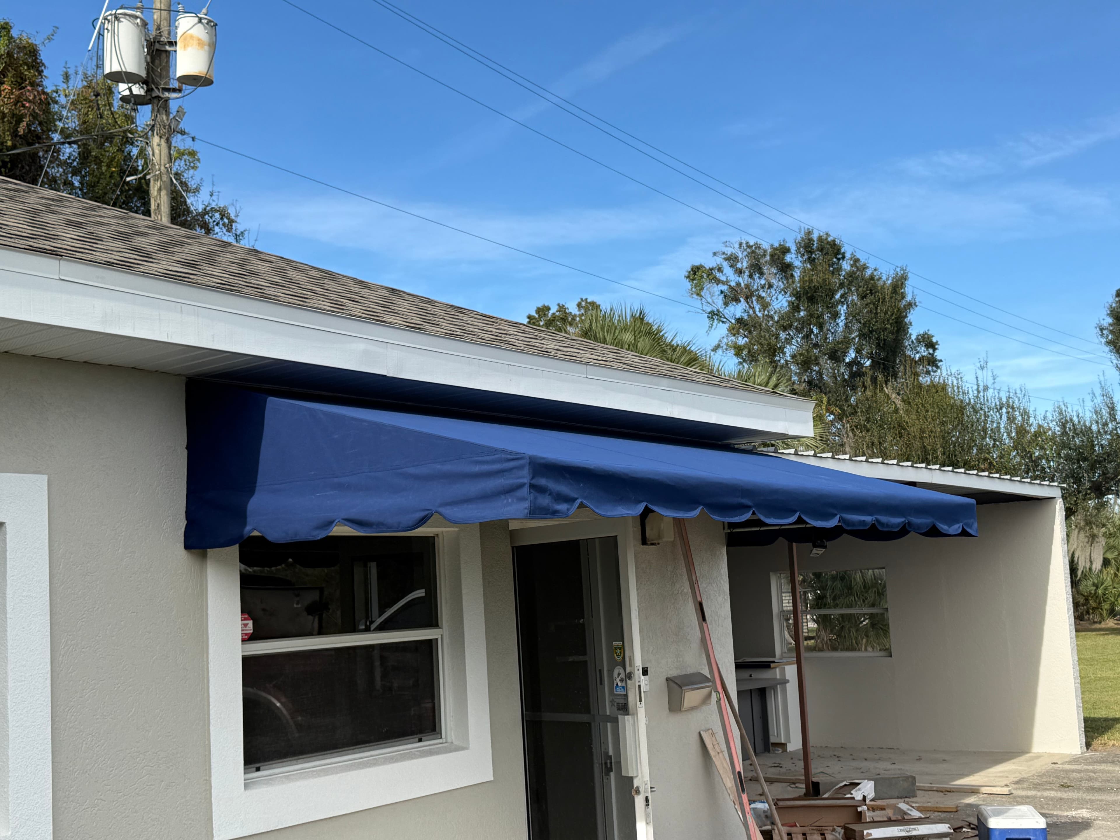 Project Marine Blue Sunbrella Awning Recover in Winter Haven FL image