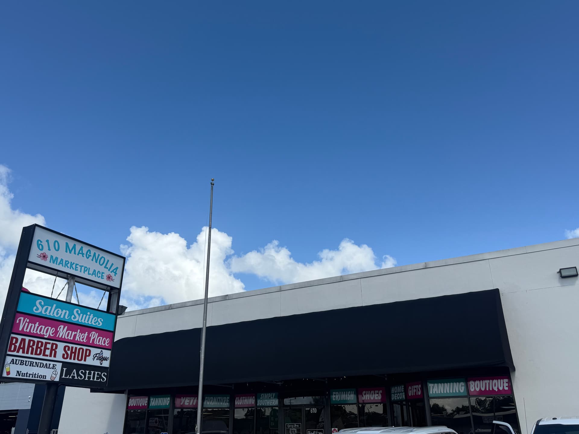 Black  awning recover at 610 magnolia marketplace in auburndale fl image