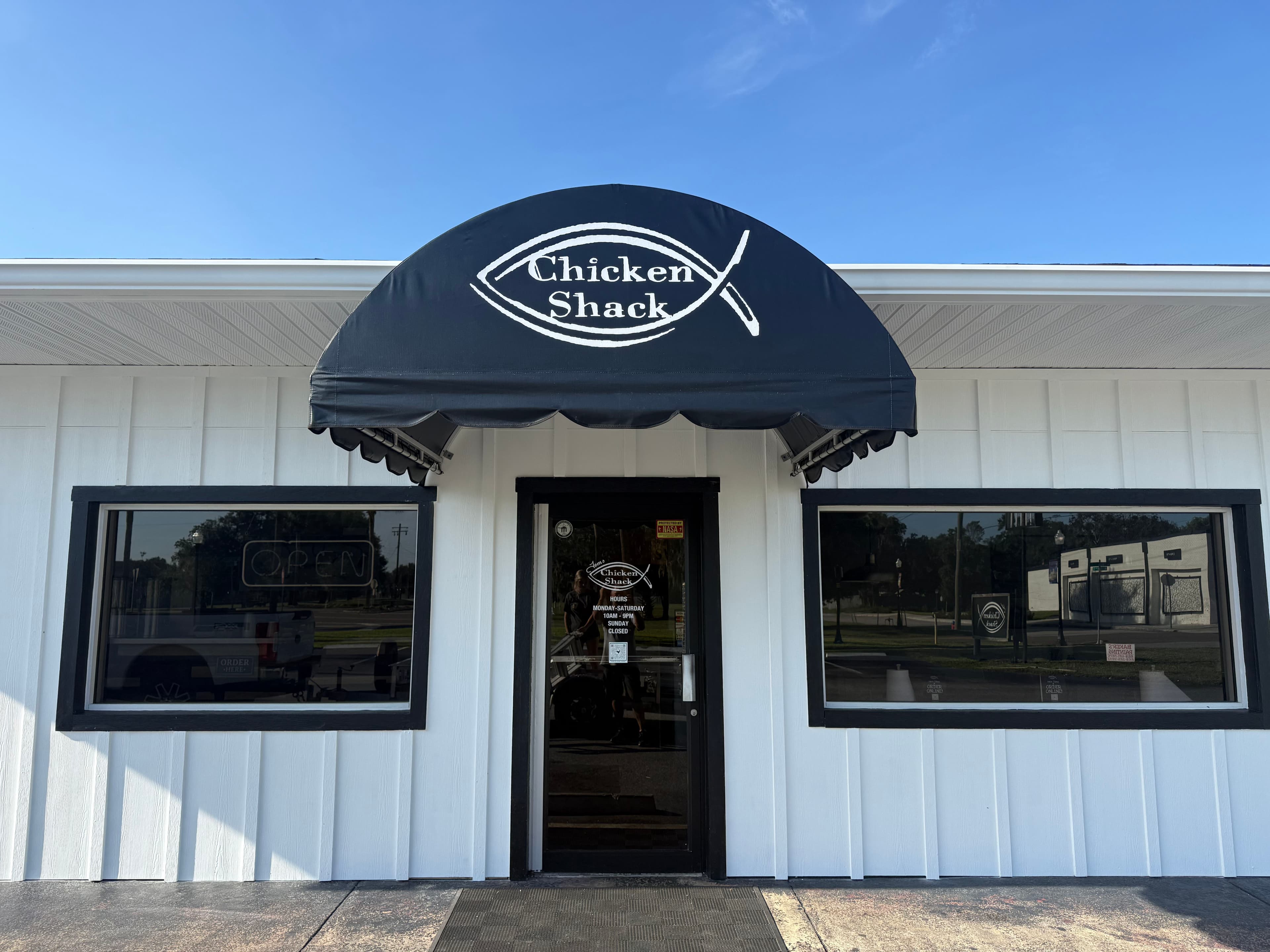 Project Custom Black Vinyl Awning Install for Chicken Shack image