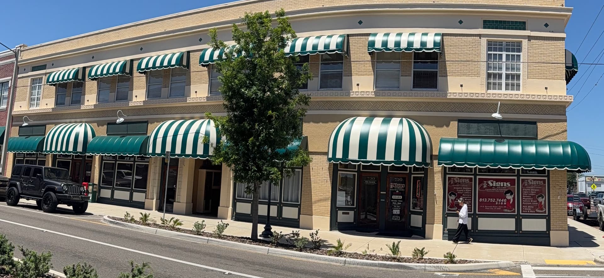 Green and White Stripe Awning Recover in Downtown Plant City image