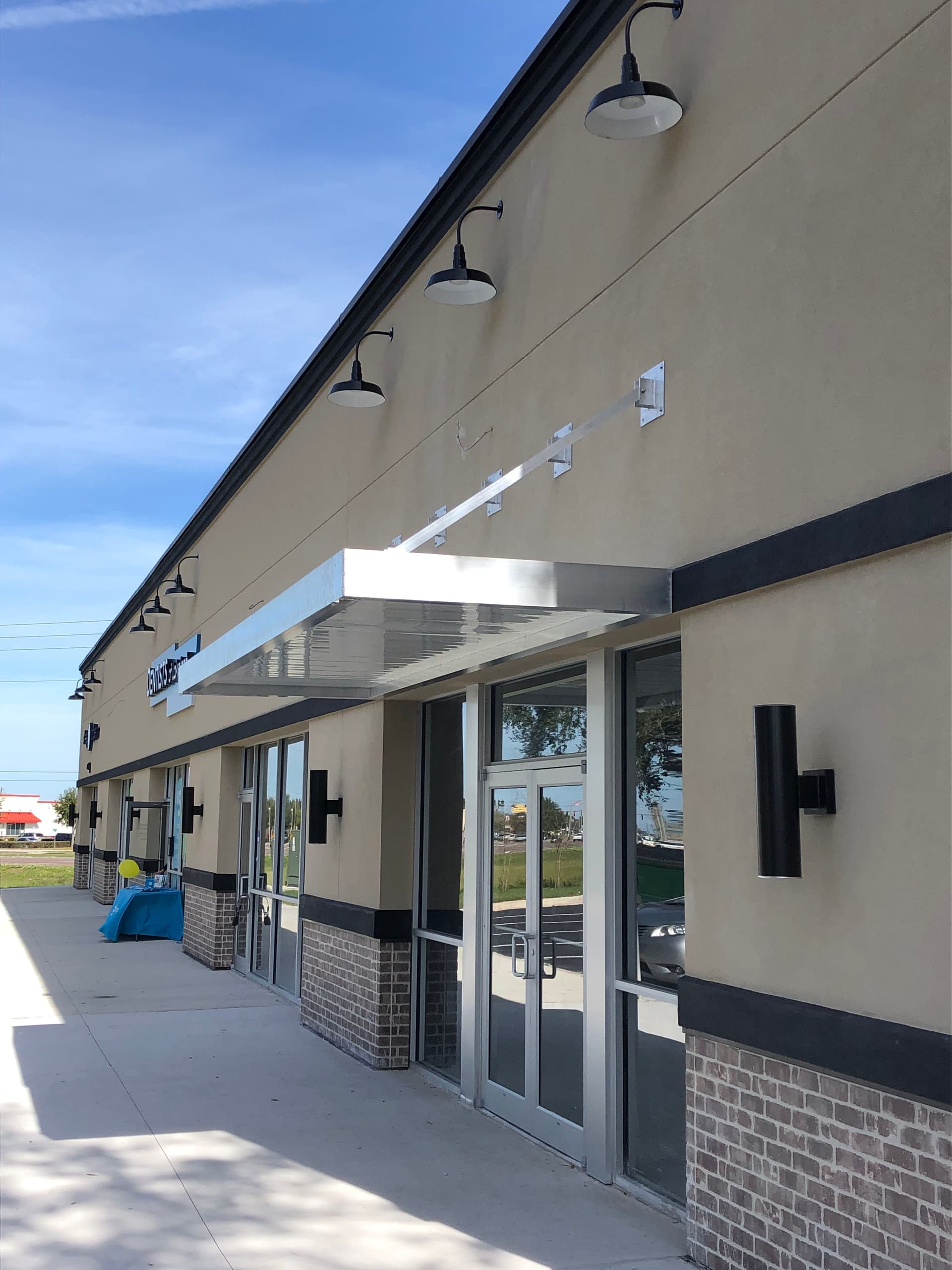 Gallery photos for Metal Canopy Installation That Sharpens Curb Appeal in Lakeland: Image #1