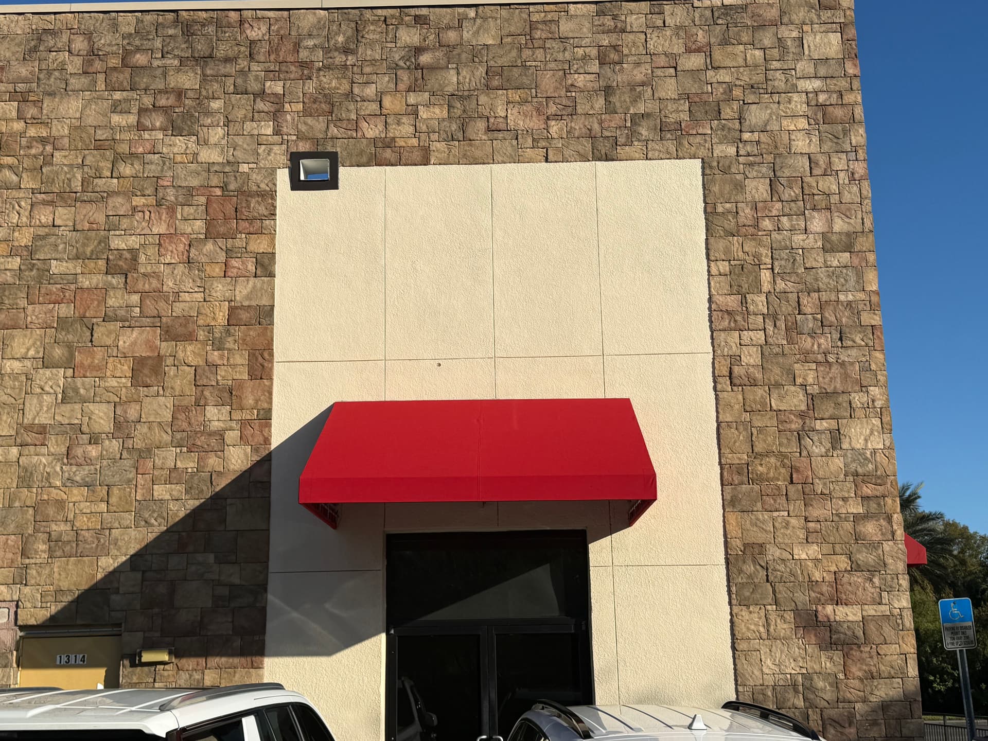 Bold Red Awning Recover at Lakeside Village in Lakeland FL image